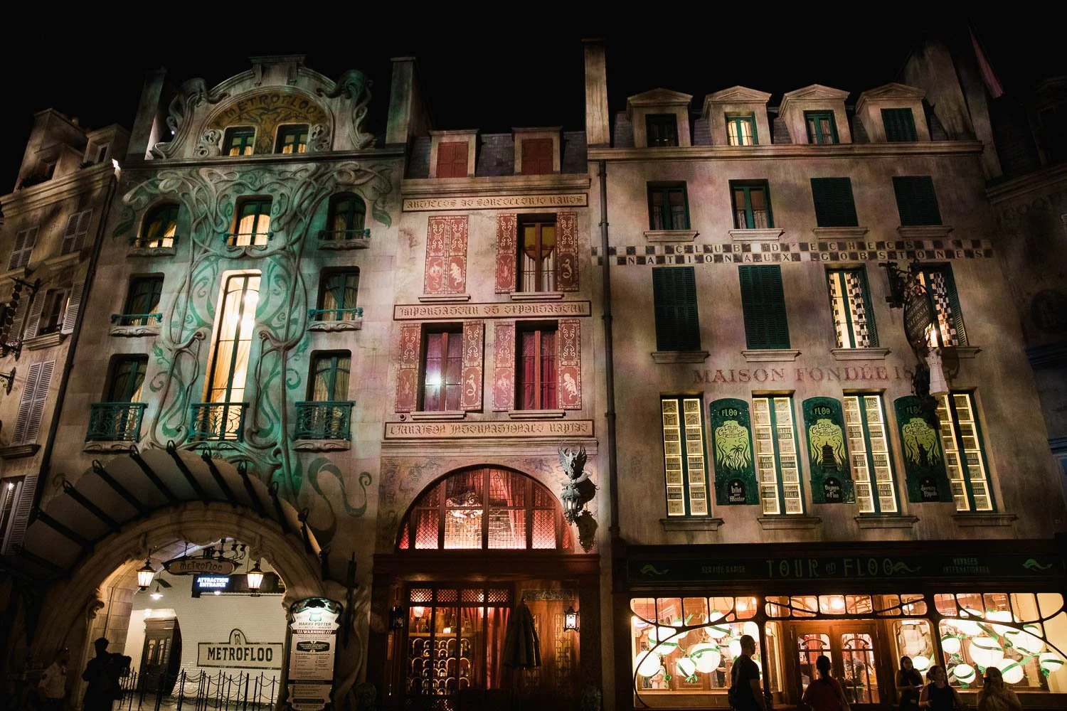 Parisian facade in Wizarding World at night.