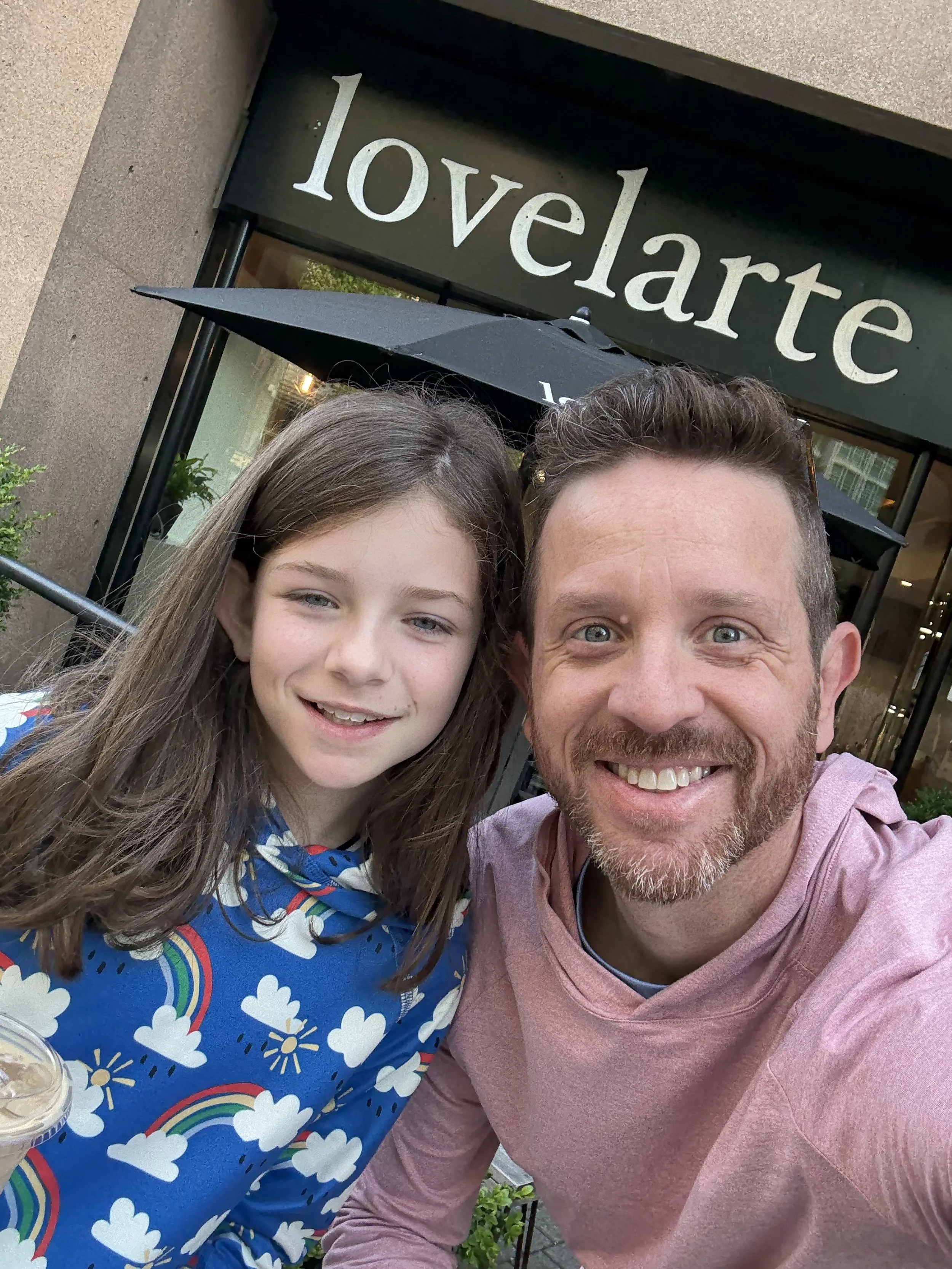 Father and daughter go for a coffee run to love larte in Vancouver.