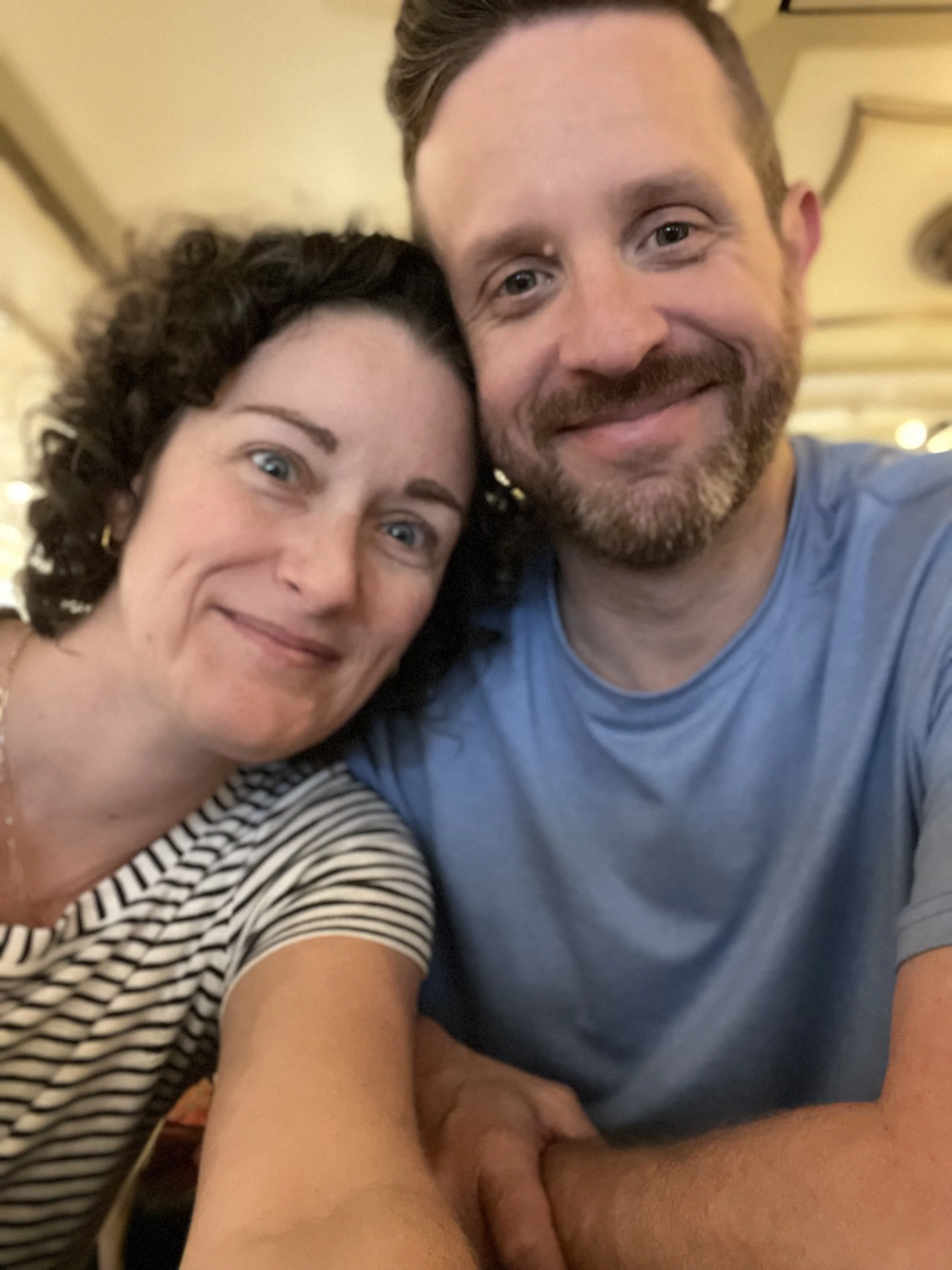 Family selfie in Tiana's restaurant aboard the Disney Wonder.