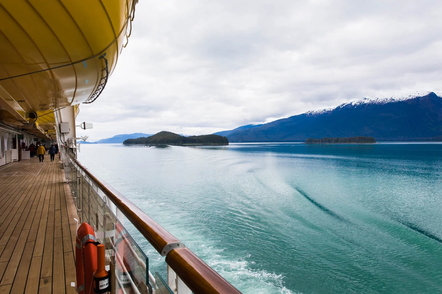 Looking down deck four of the Disney Wonder at the gorgeous water in Alaska.