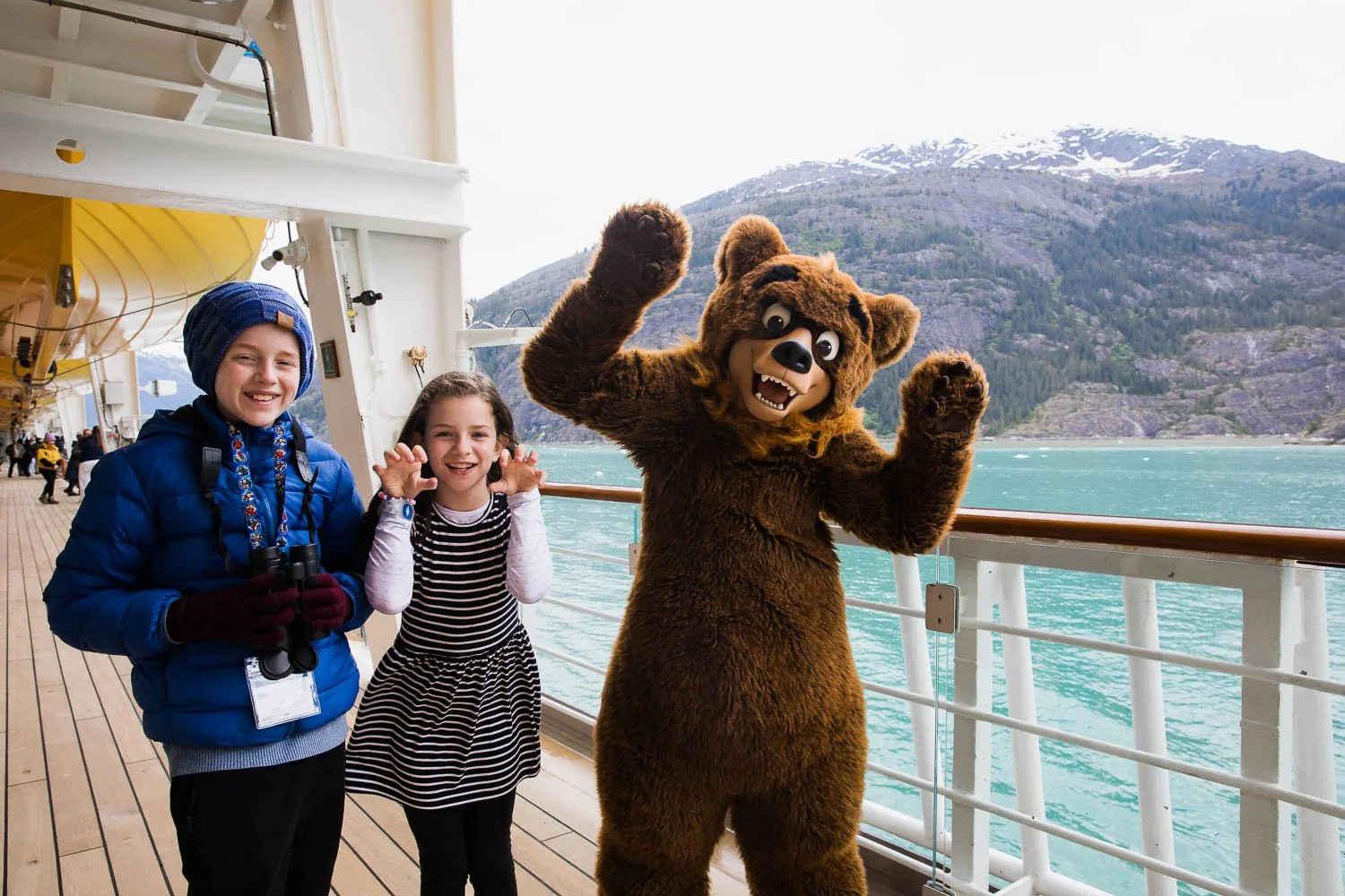 Siblings meet Koda from Brother Bear on the Disney Wonder cruise ship.