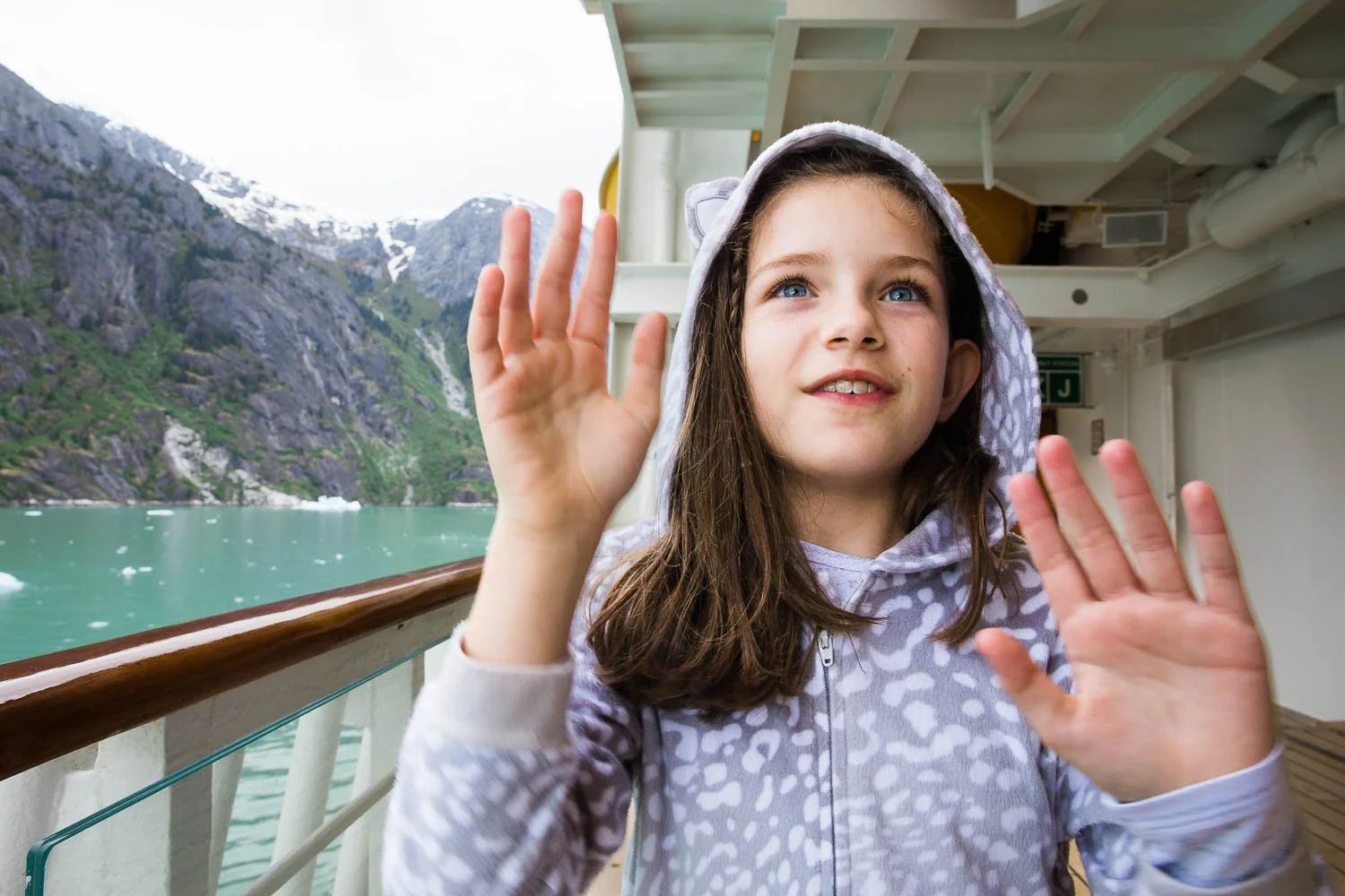 Little girl enjoys deck four of the Disney Wonder in Alaska.