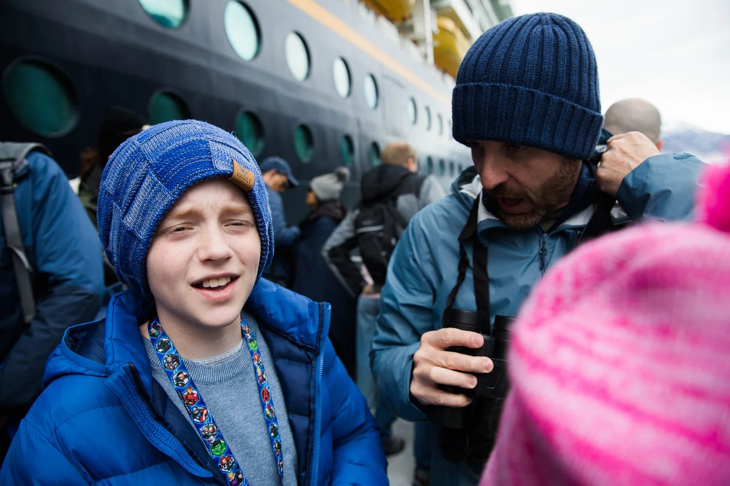 Family boards boat excursion in Alaska.