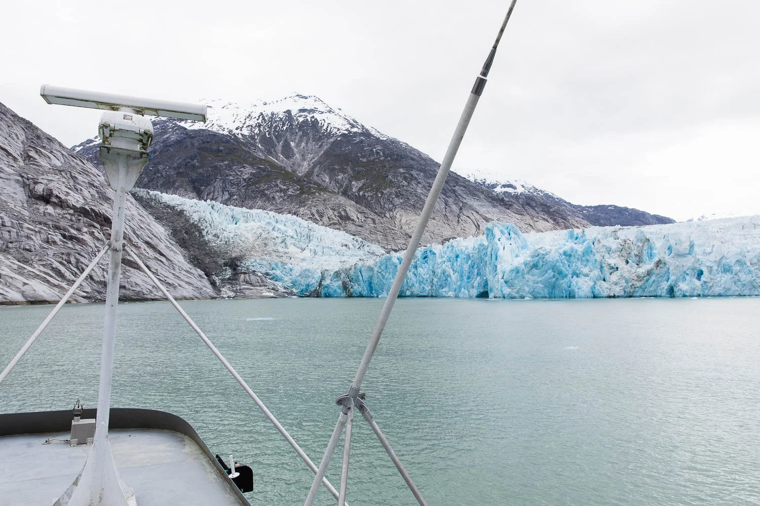 View of glacier from top deck of a boat excursion. 