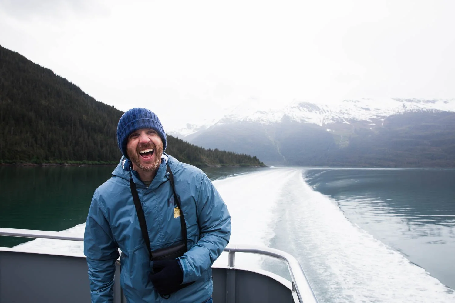 Enjoying an Alaskan fjord excursion from a boat.