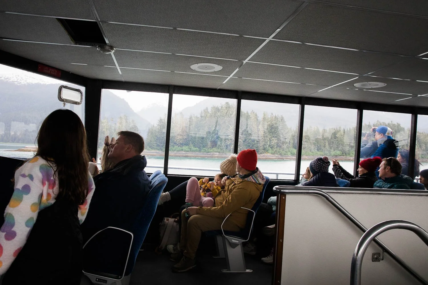 View of Alaska fjord from inside a boat.