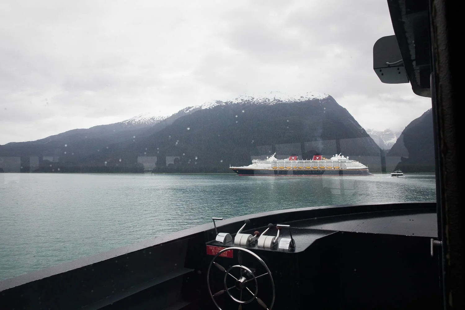 View of the Disney Wonder from a boat excursion in Alaska.