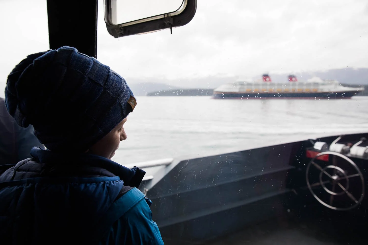 View of the Disney Wonder from inside an excursion boat.