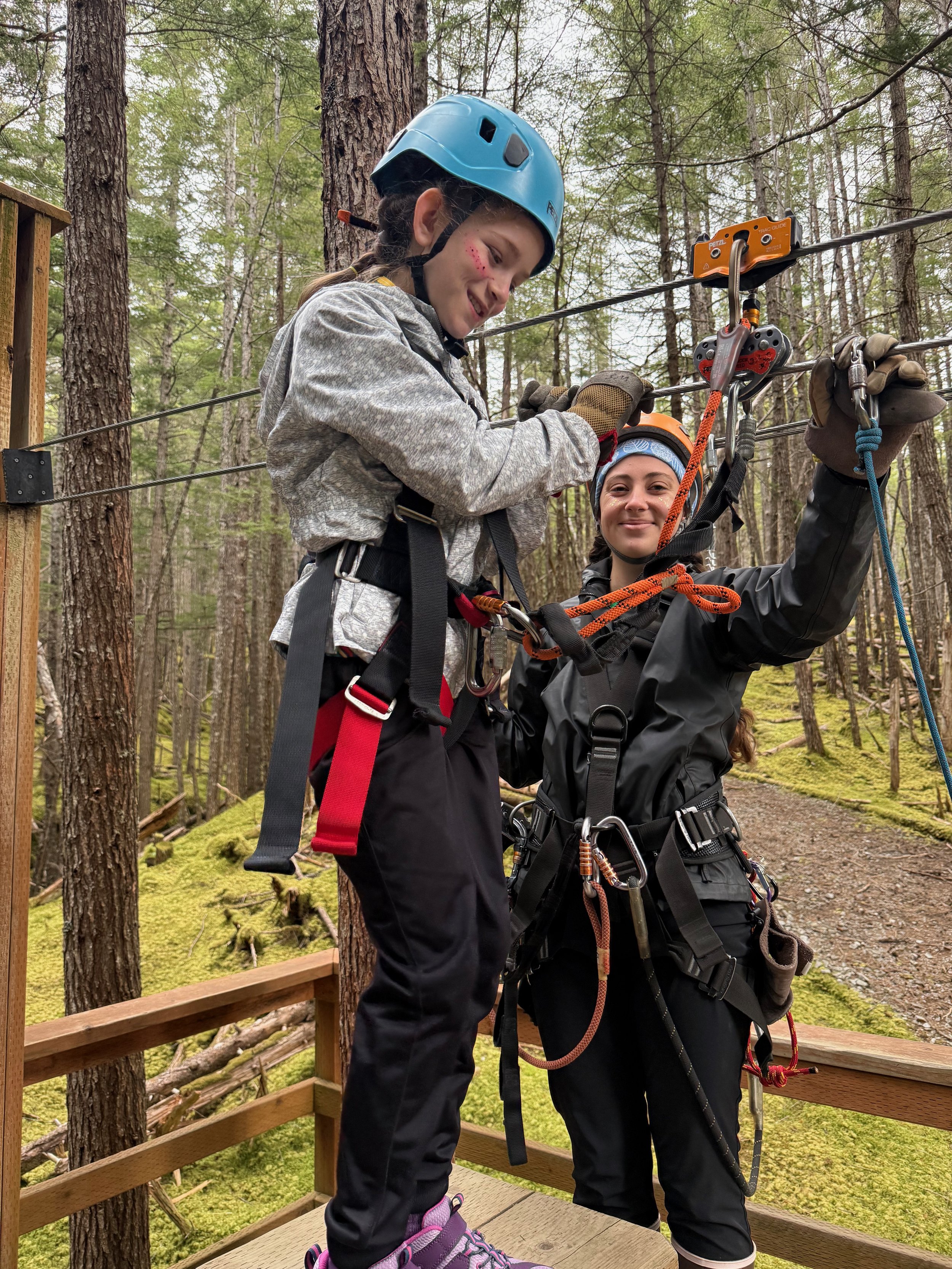 Girl prepares for her first zipline in Alaska.
