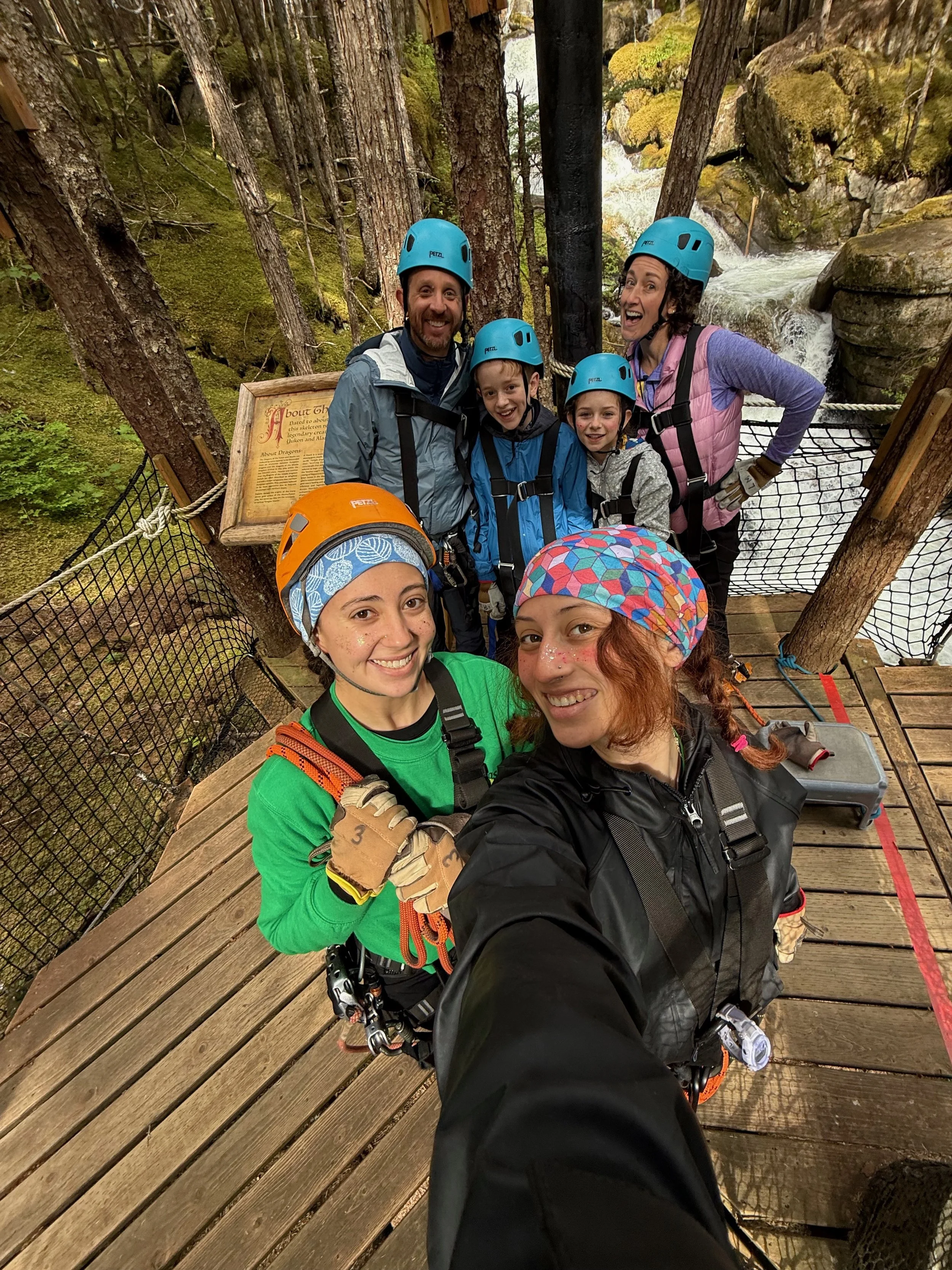 Family and their tour guides in Grizzly Falls, Alaska.
