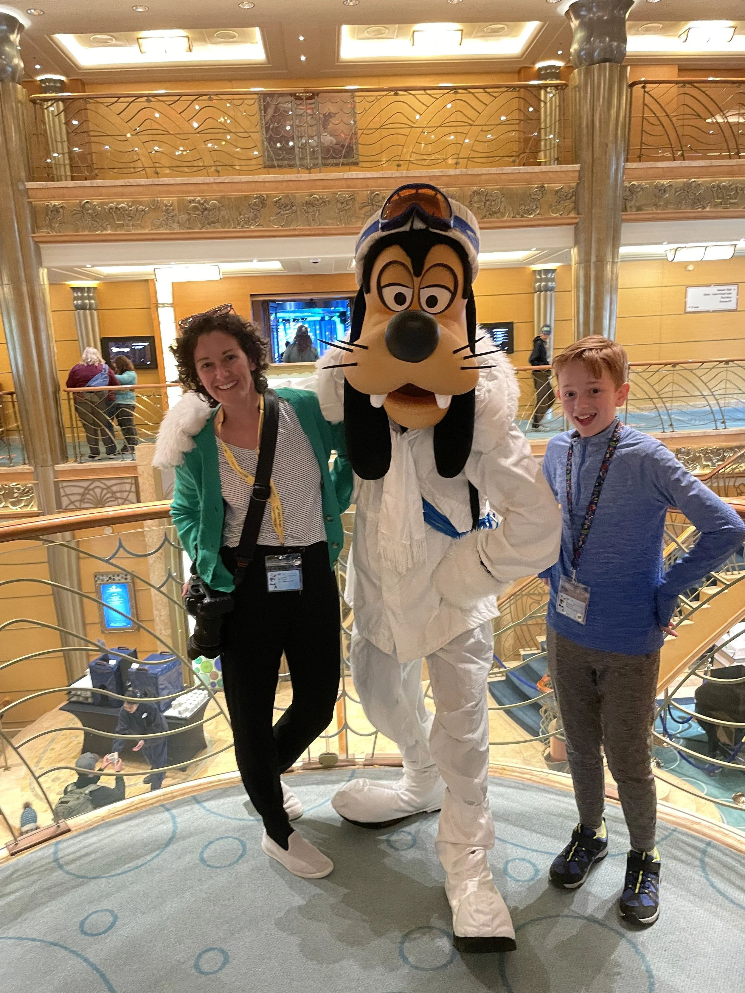 Mother and son meet Goofy on Alaska cruise aboard the Disney Wonder.