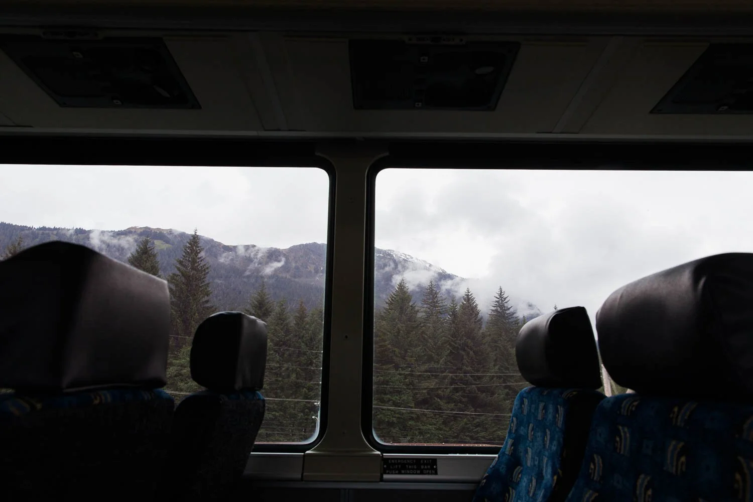 View of mountains in Juneau, Alaska from a bus.