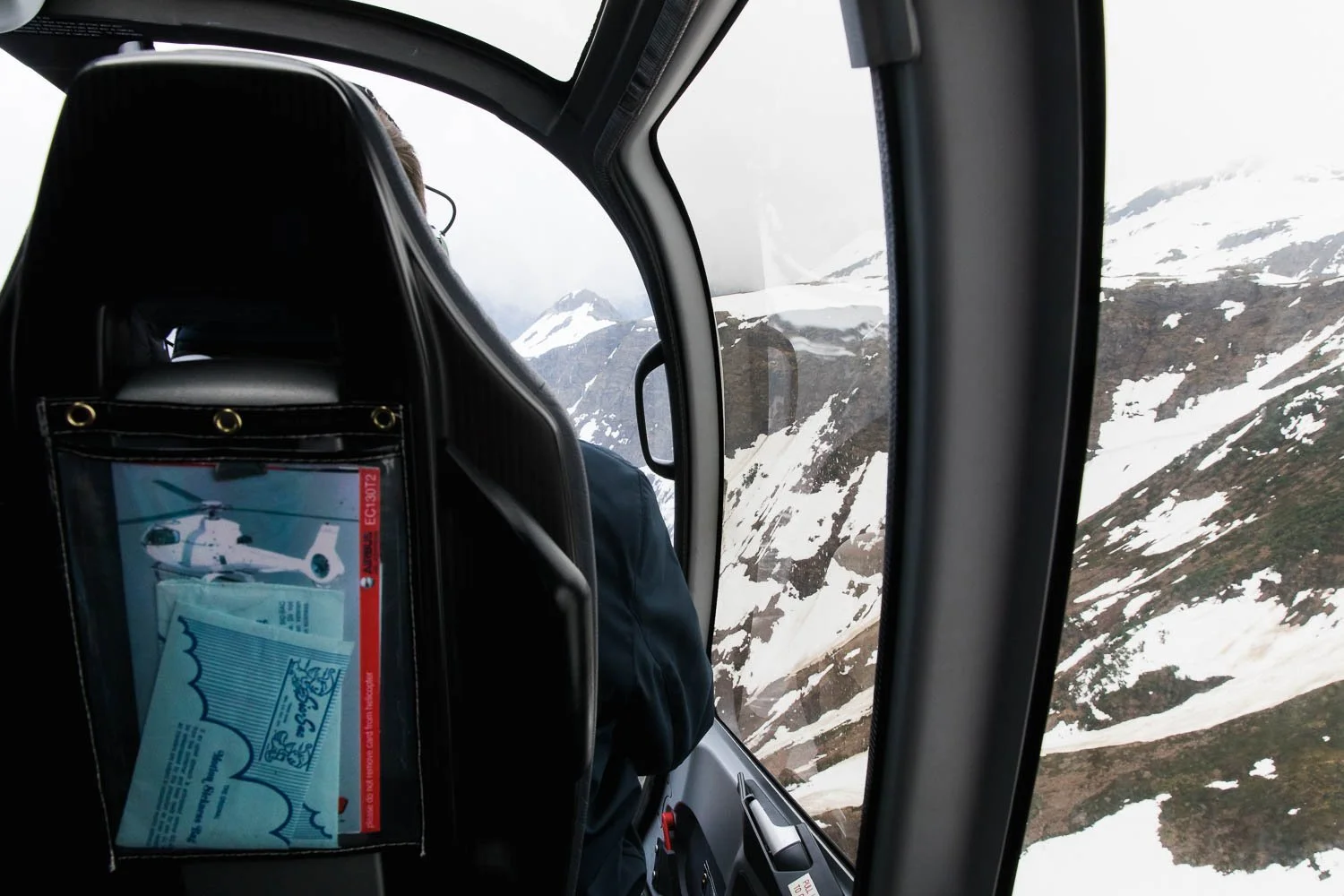 View from the second row of a helicopter in Alaska.