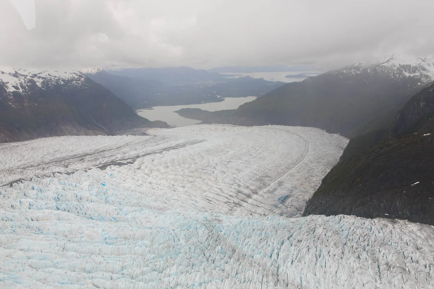 View from above Mendenhall Glacier looking out across Mendenhall Lake.