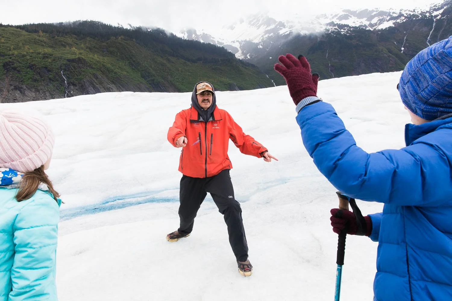 Kids answer questions for a tour guide on Mendenhall Glacier in Alaska.