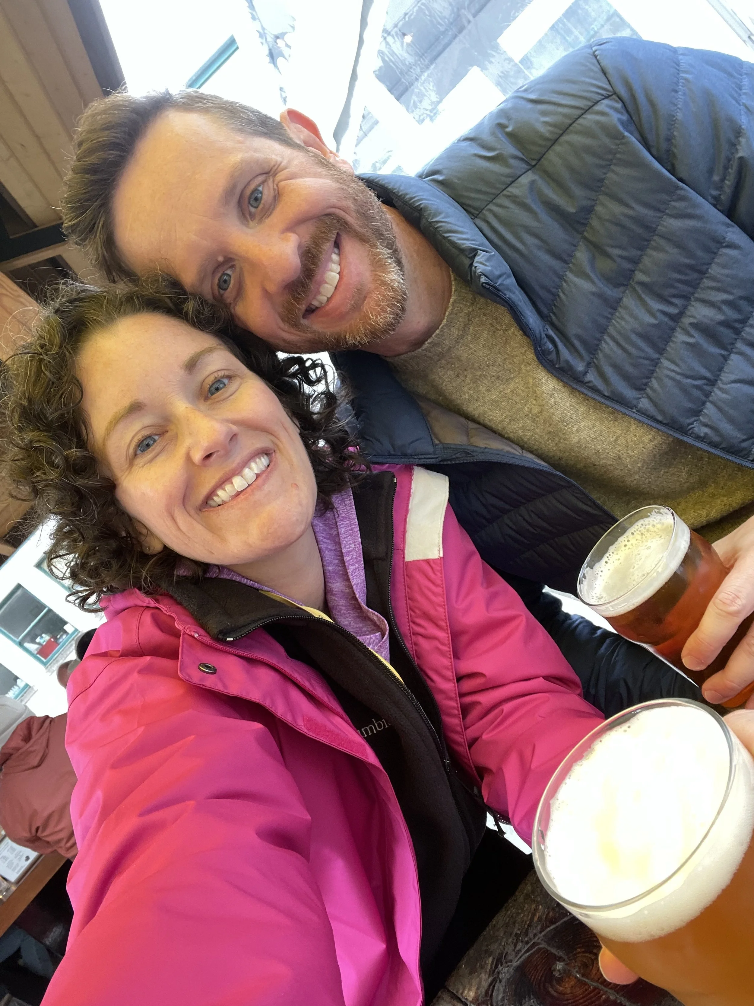 Couple enjoys beers at Deckhand Dave's in Juneau, Alaska.