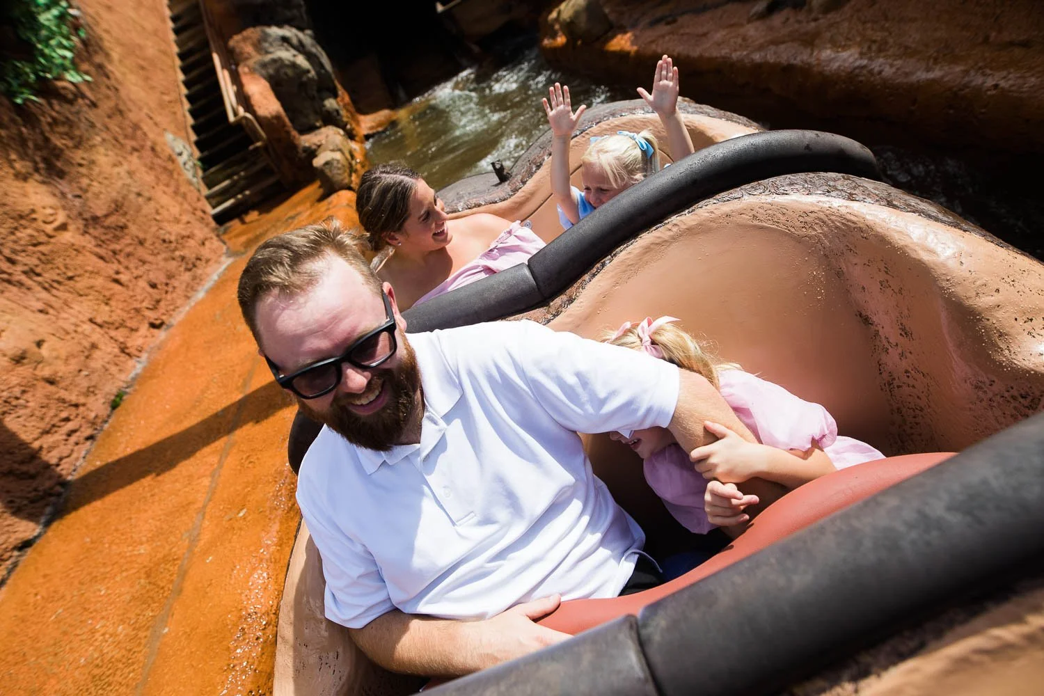 Family rides Tiana's Bayou adventure at Magic Kingdom.