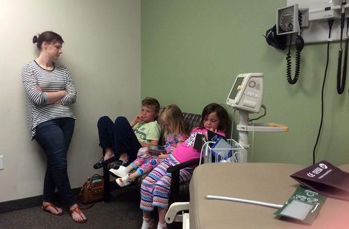 Shauna with Jude, Penny and Abbey waiting in the doctors office waiting to be seen. 