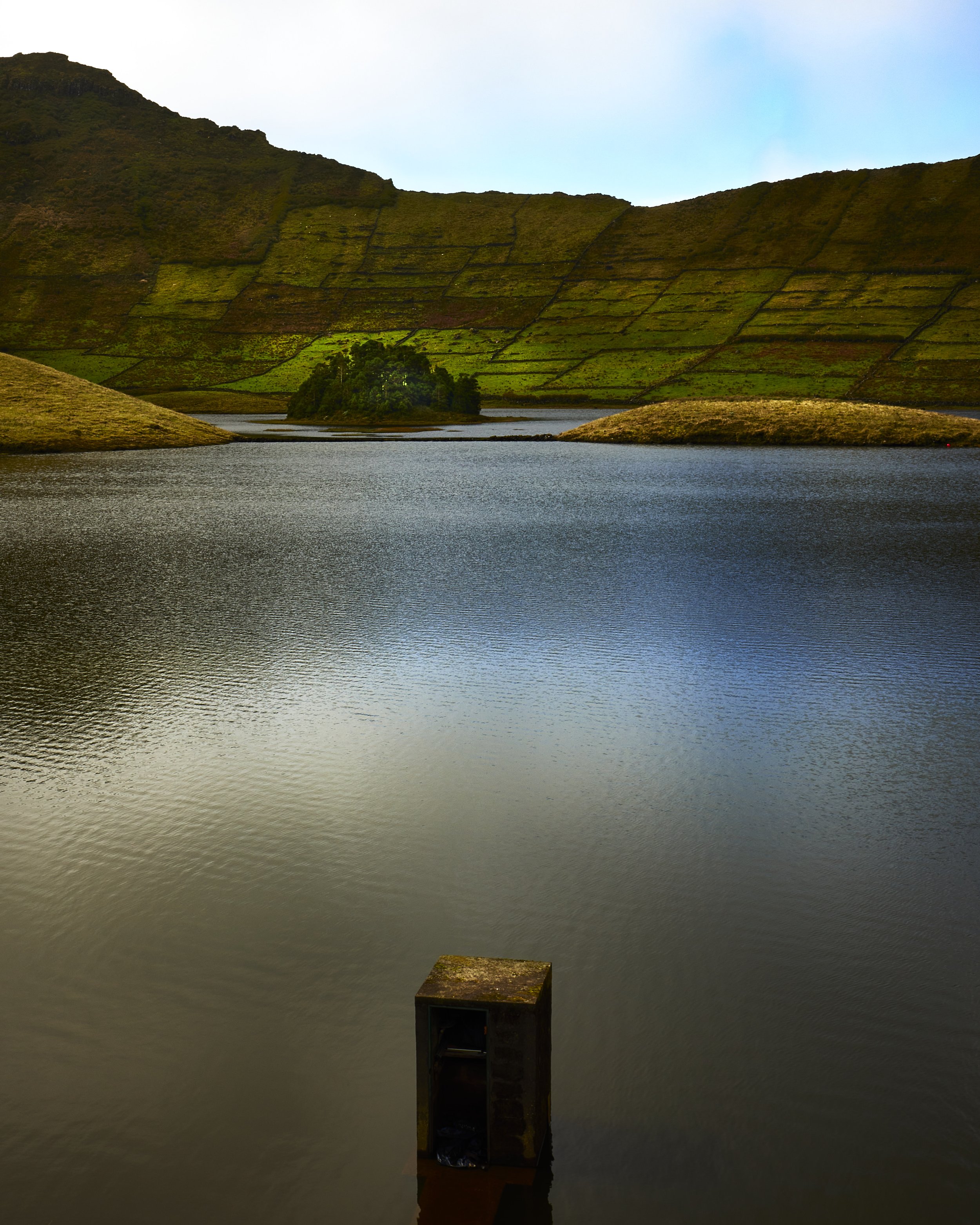 A Lake in Corvo Volcano Caldera, Corvo Island, Azores by Greg Frucci