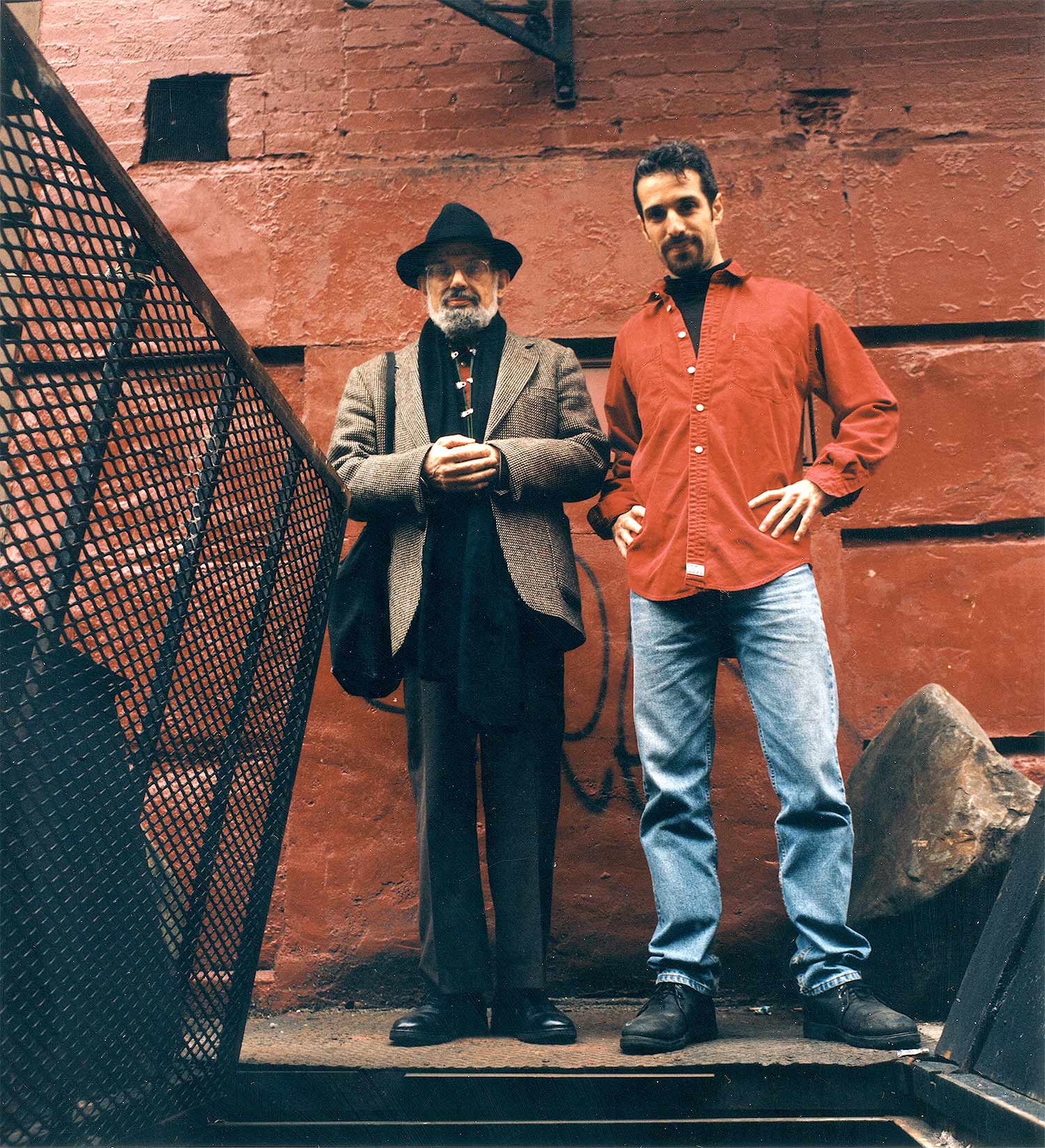 Allen Ginsberg & Eric Drooker on East 10th Street, NY City. Photo ©1996 Denise Keim