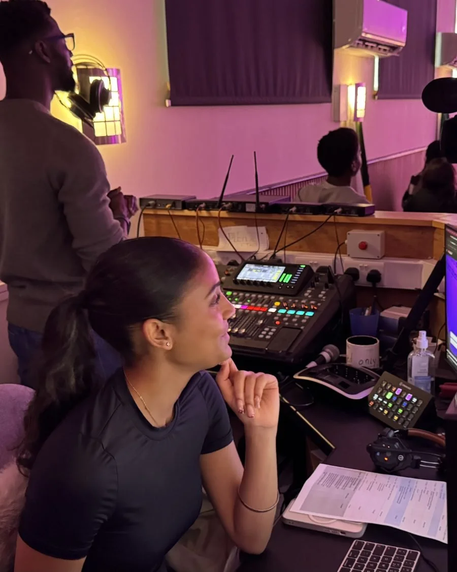 Volunteers running the sound desk during a service