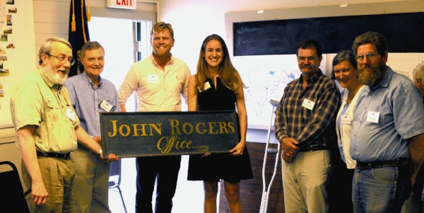 Normal
0
false
false
false
EN-US
X-NONE
X-NONE
MicrosoftInternetExplorer4
Presentation of 200-year old office sign of Attorney and Rogers House builder, John Rogers. Left to right, John Adams, Chair, Orford Selectboard; Carl Schmidt, Orford Historical Society; new Rogers House owners, Jared and Elise Henningsen; Paul Goundry, Selectboard member; Anne Duncan Cooley, former Selectboard Chair; David Smith, Selectboard member. Photo by Ted Cooley.