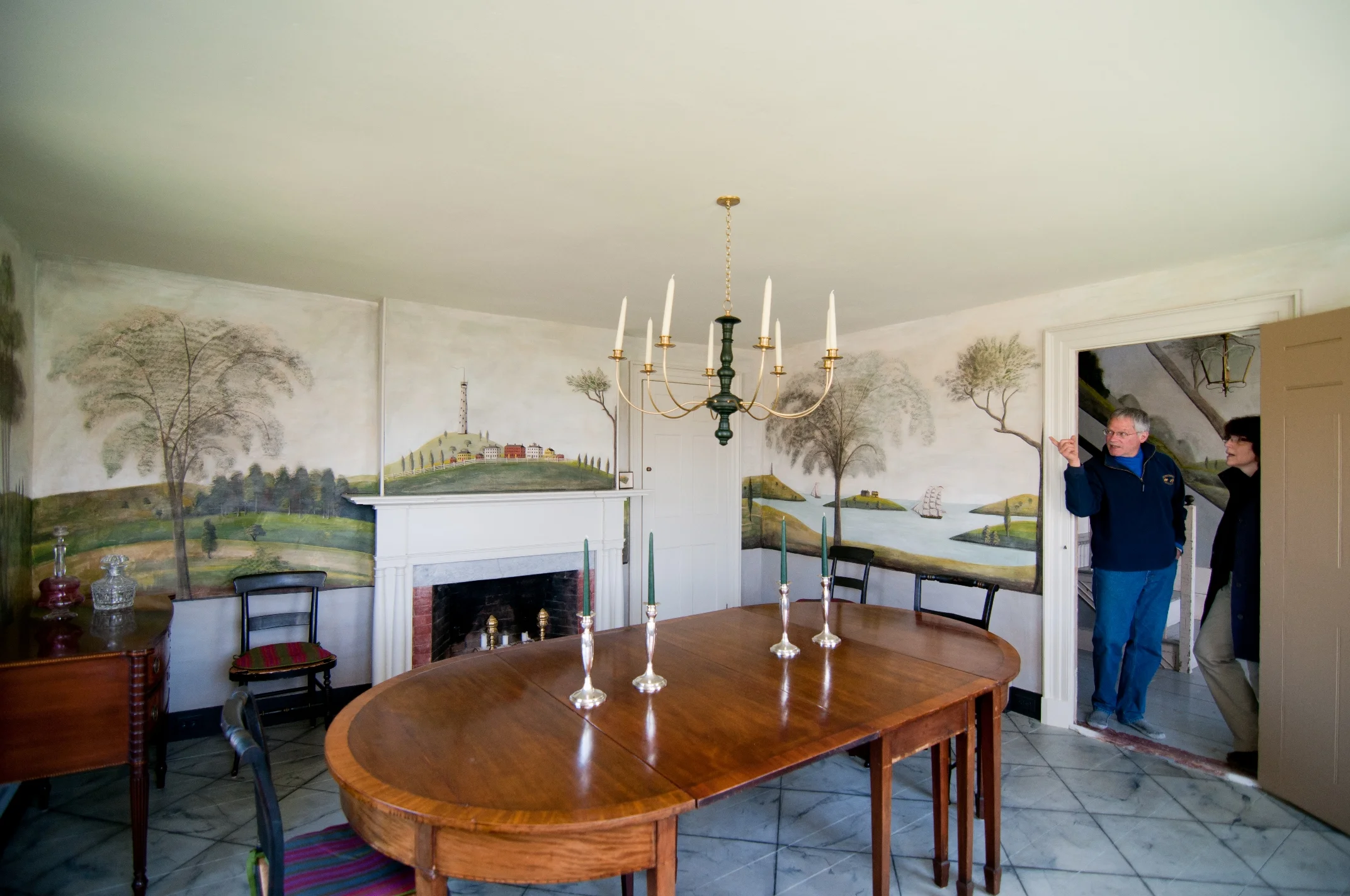 Tim Cook (at left, with former Preservation Alliance board member Sue Booth) described the preservation easement that protects his 1811 federal farmhouse with rare, intact Rufus Porter murals at the recent Passing It On program. Photo: Steve Booth