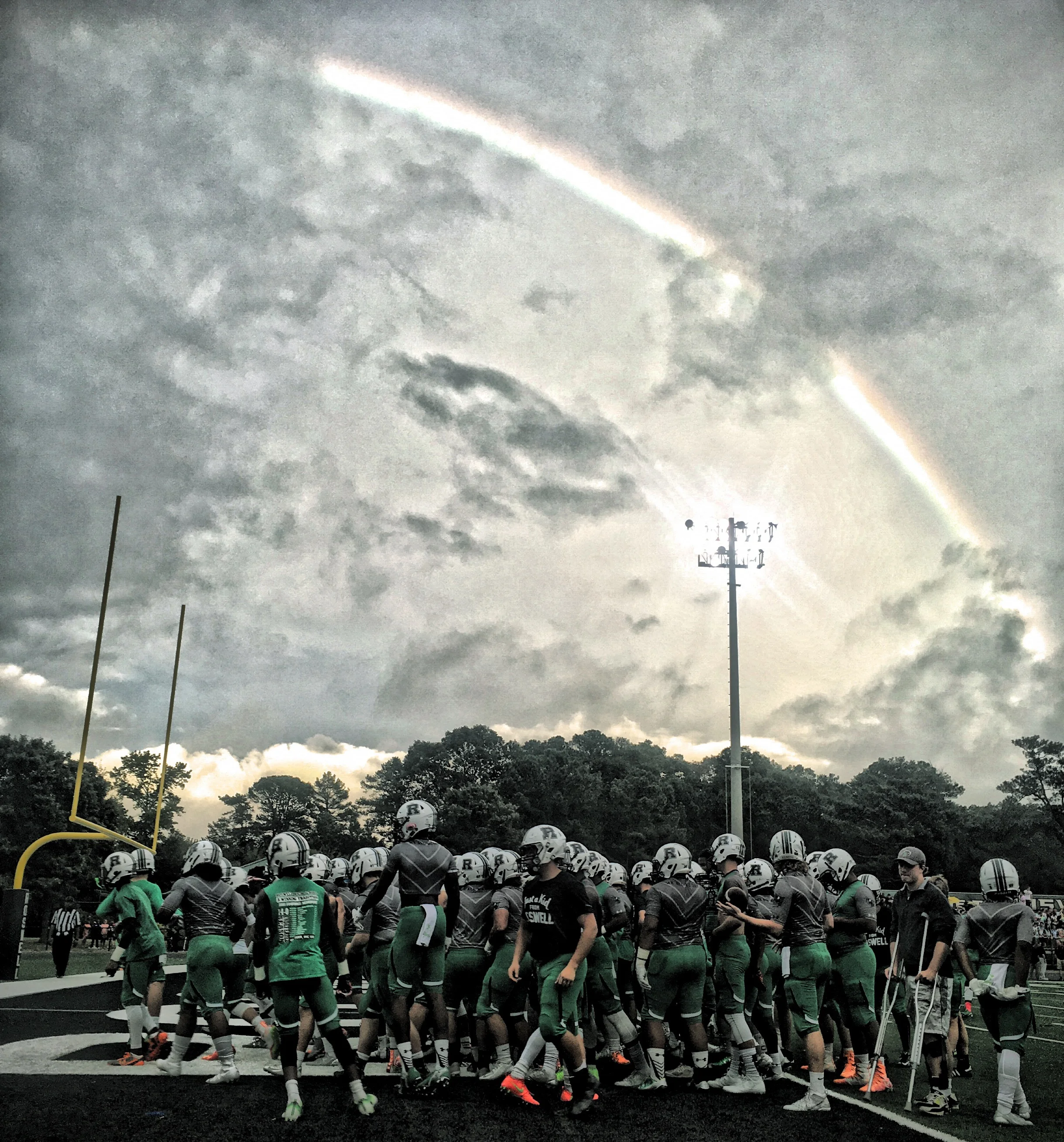 A rainbow over Roswell before the game. 