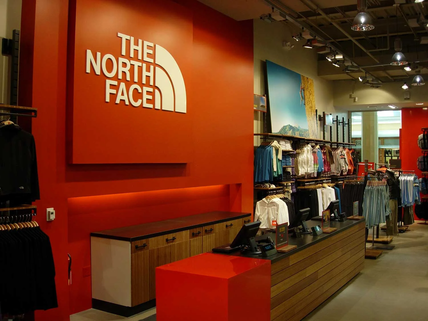 orange north face sweater