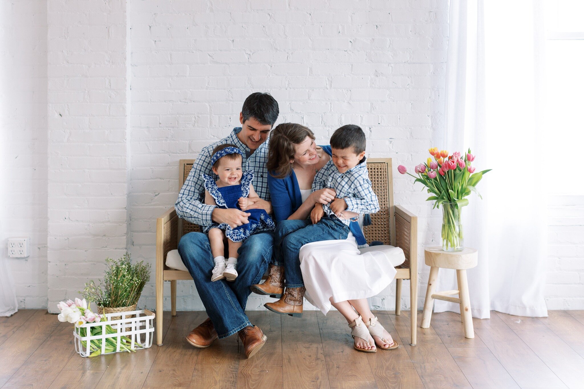 This heartwarming picture captures the love and playfulness between a growing family😍 Share what you love most about being part of a family in the comments below. We can't wait to hear your thoughts and reflections! 💕 #familyportraits 
.
View our b