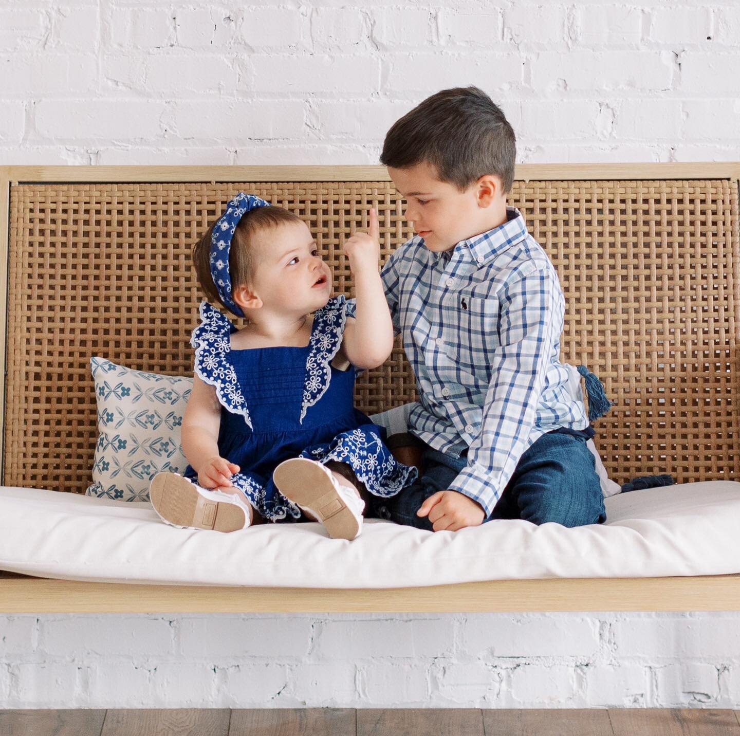 This adorable munchkin sure knows how to give her brother a piece of her mind! 🤣 Check out the cuteness overload as she holds a finger to his face. 😍 Comment below with your best guess of what she's saying - we can't wait to hear from you! 😊 #sibl