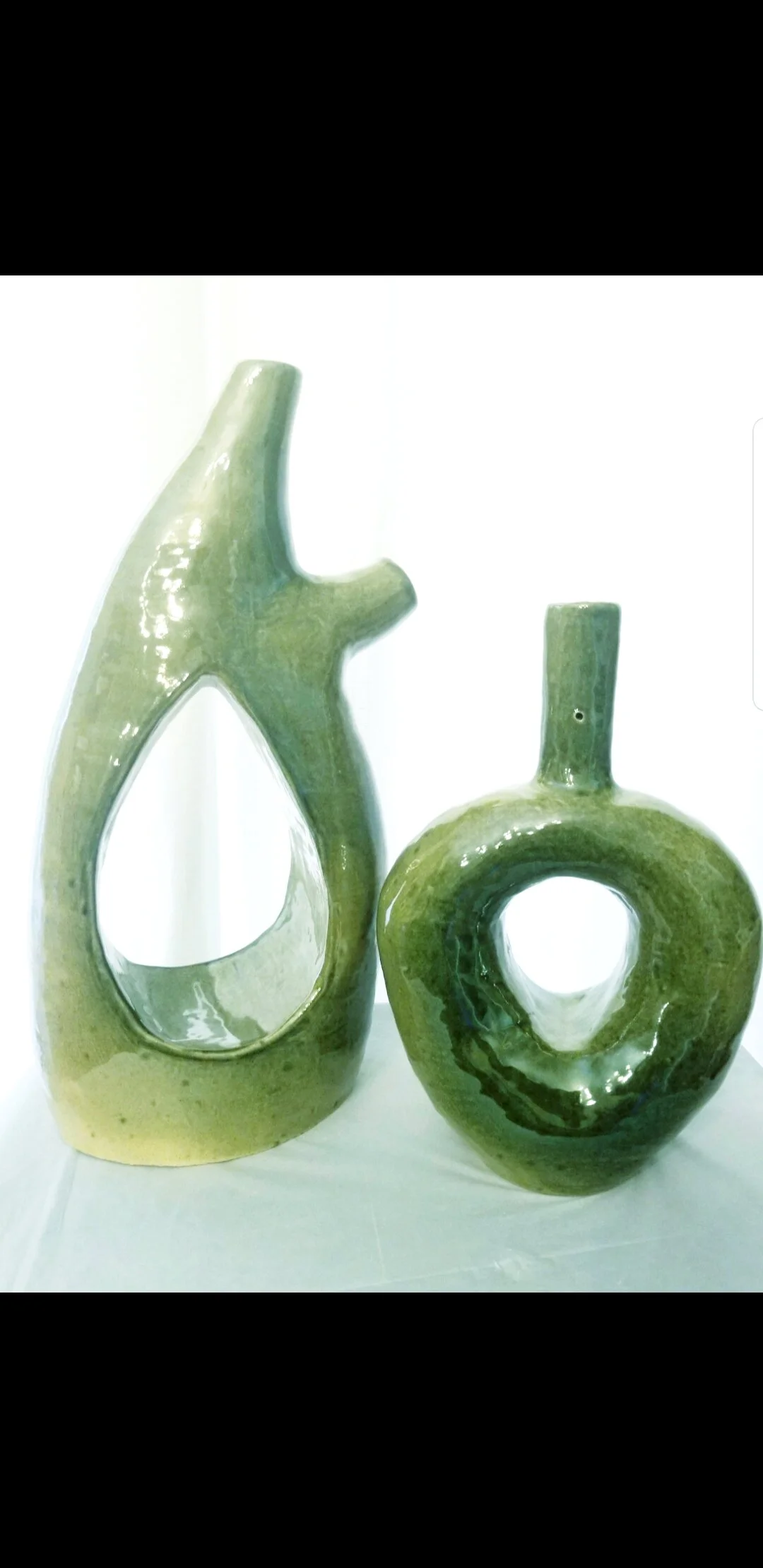 GREEN VASES - LOCATED AT THE LITTLEMARKET PLACE