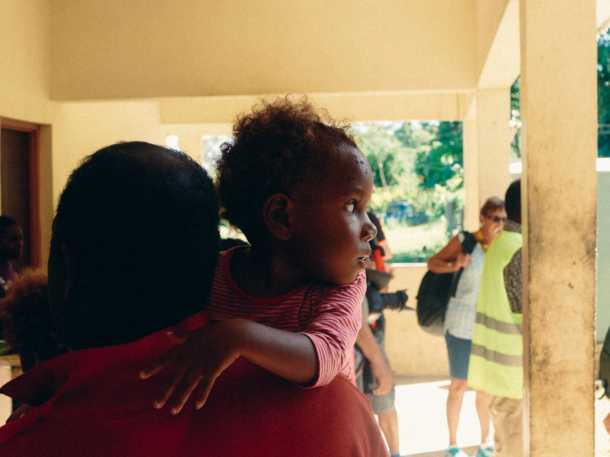 Girl and mother at airport Pentecost Island, Vanuatu, Melanesia, South Pacific.