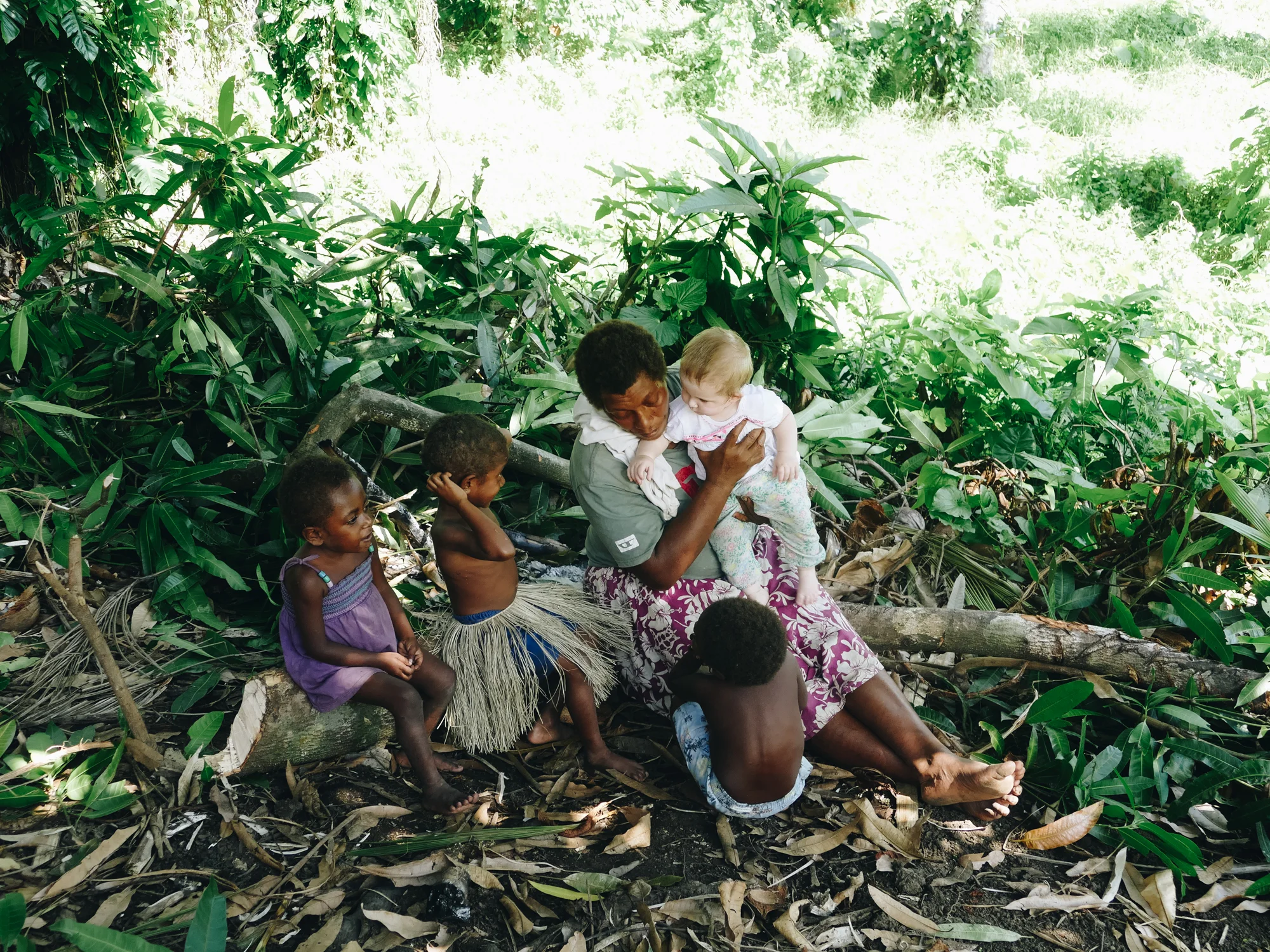 Vanuatuan woman with caucasian baby on Pentecost Island, Vanuatu, Melanesia