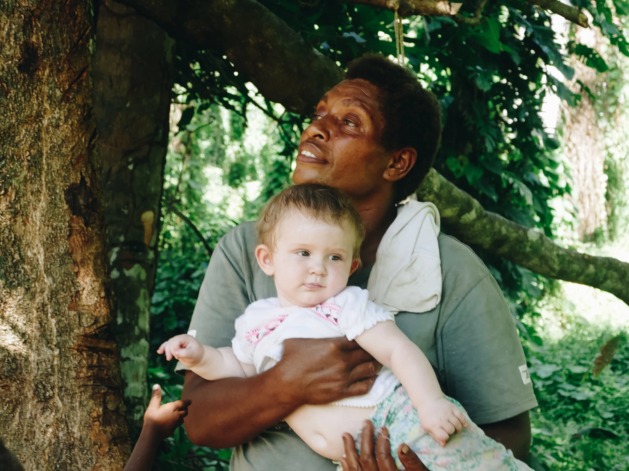 Vanuatuan woman with caucasian baby on Pentecost Island, Vanuatu, Melanesia