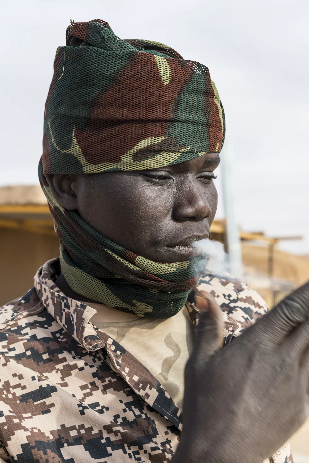 Soldier in a village at Ounianga kebir part of the the Unesco sight Ounianga lakes, northern Chad, Africa