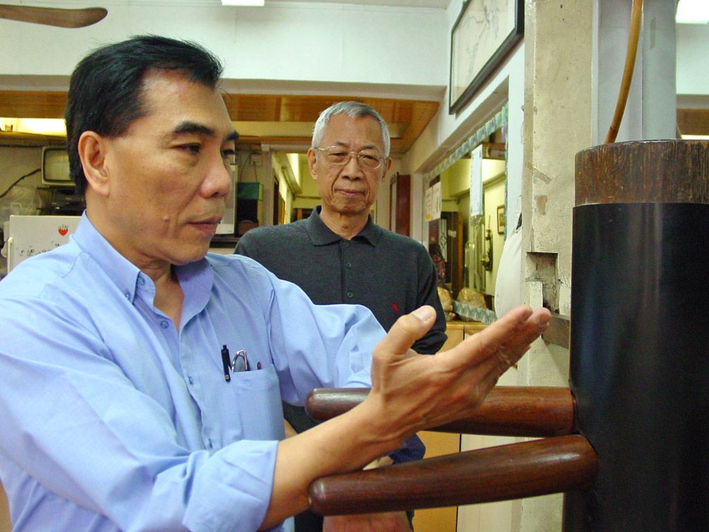 My Sigung observing my Sifu doing the dummy form