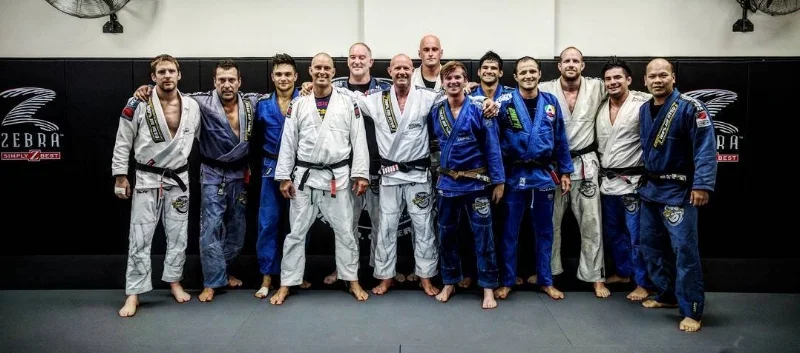 Group shot of brown and black belts after a training session at HQ, 2016.