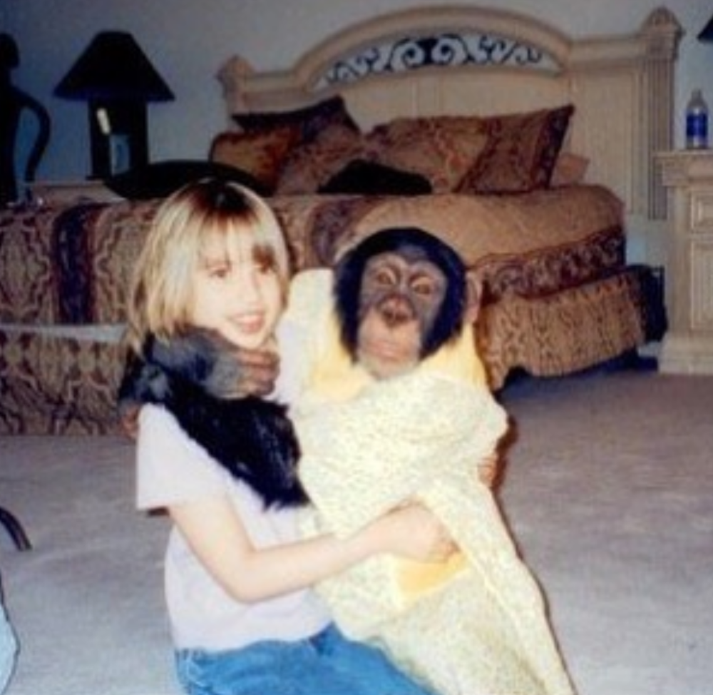 Baby Katie with monkey