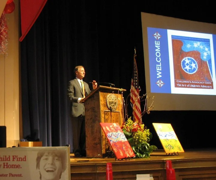 Tennessee Gov. Bill Haslim with Tennessee Flag by Gregory Beck
