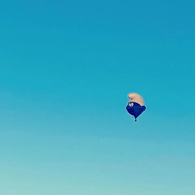 Seen smurfing up ma neighborhood. #smurfs #hotairballoon #abqballoonfiesta