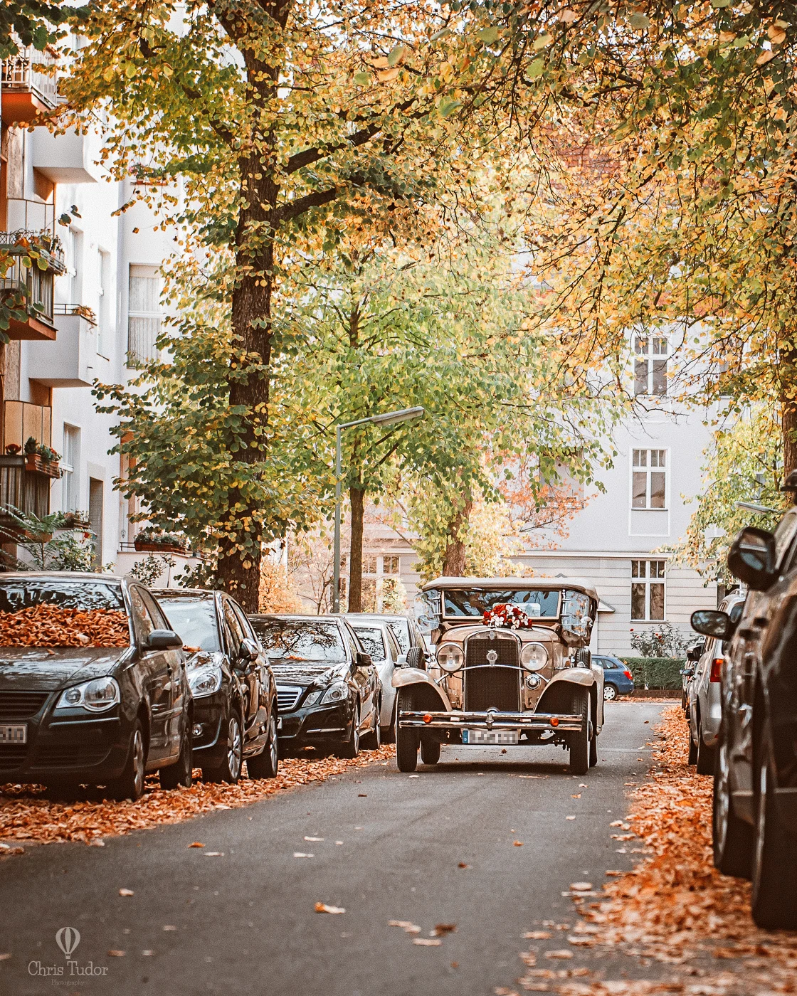The oldtimer car, a 1931 Chevrolet, arranged by N. as a surprise wedding day gift for I., was a real eye turner on the streets of Berlin.