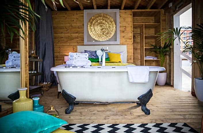Freestanding bath and bed - photo by Guy Yehieli