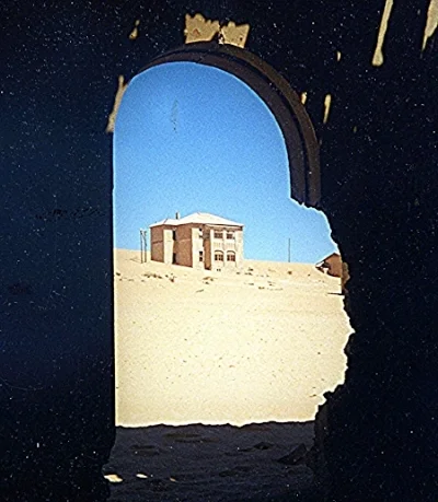 View from one abandoned house to another - Kolmanskop