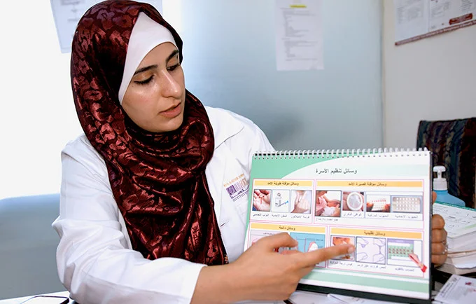 Dr.-Hiba-Displaying-Info-on-Contraceptives_newsbanner.jpg