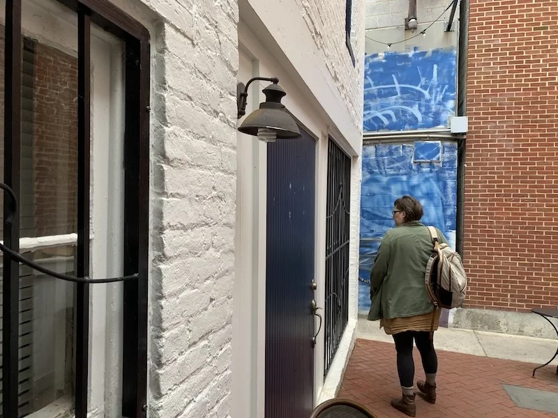 Starbucks patio with Community Room back entrance