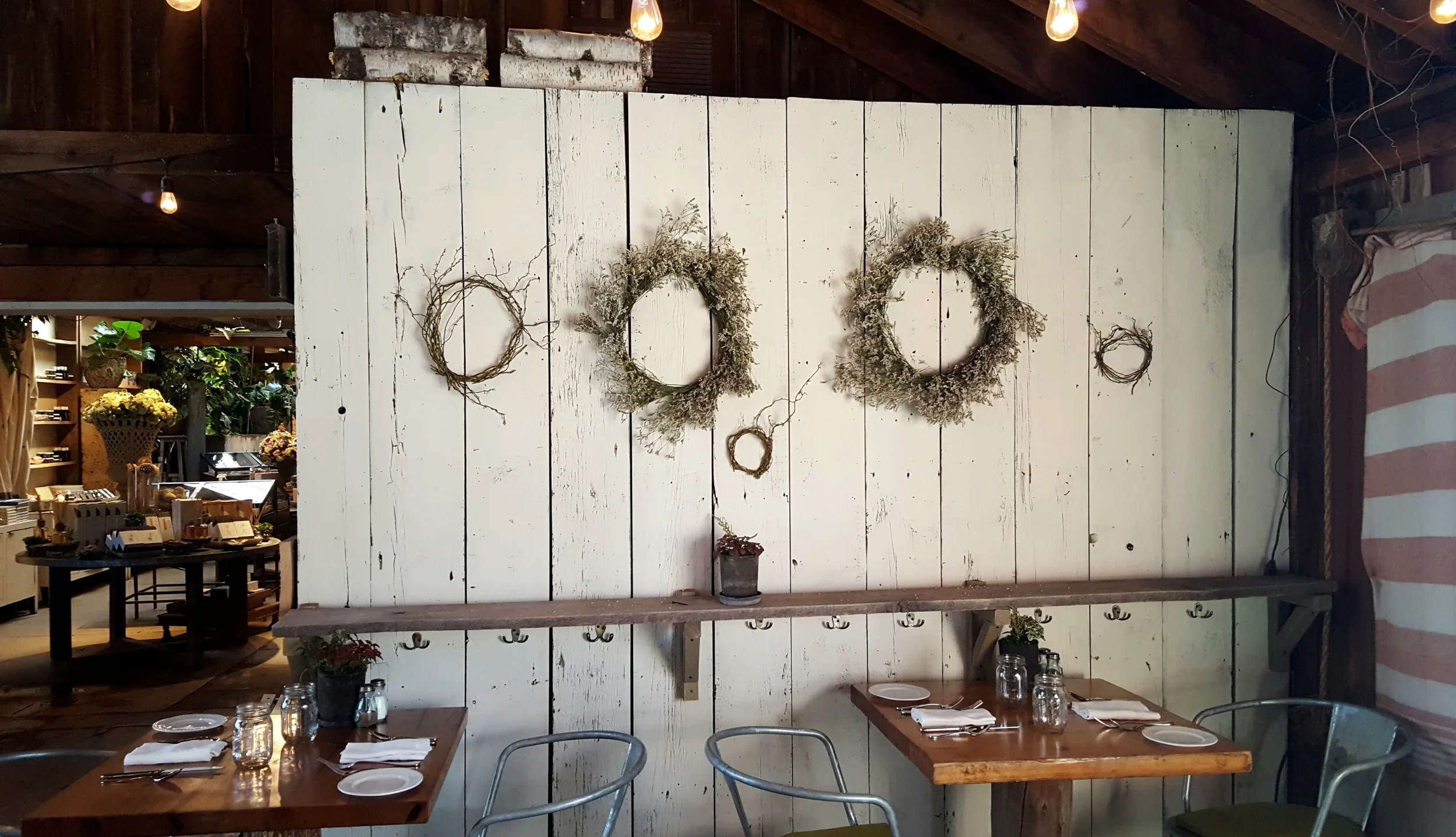 Charlene loves dried flowers as much as fresh. This distressed wall with dried floral wreaths is a wonderful backdrop for a rustic event.