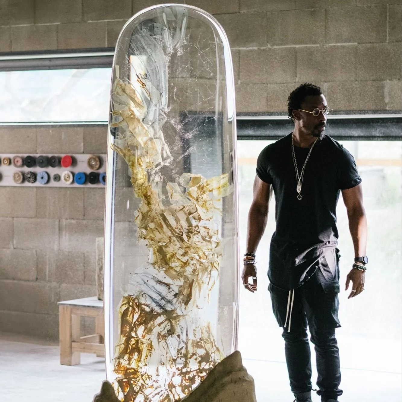Enjoy a closer look at #AKClient @iniarchibong's design behind the newly unveiled Atlas of Smoke ✨ Standing at 2.3 meters tall, this is the largest Vitrucell glass sculpture ever created 🤩

We&rsquo;re inspired by Archibong&rsquo;s process, rooted a