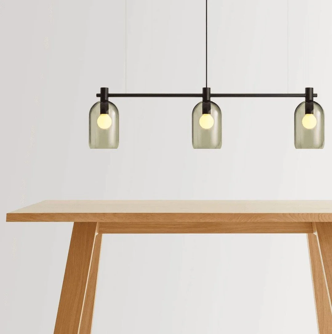 We&rsquo;re spotlighting lighting products from #AKClients @bludot and @humanscale that bring warmth, balance, and well-being to modern living and working spaces. Blu Dot&rsquo;s sculptural lamps and chandeliers add softness and personality, creating
