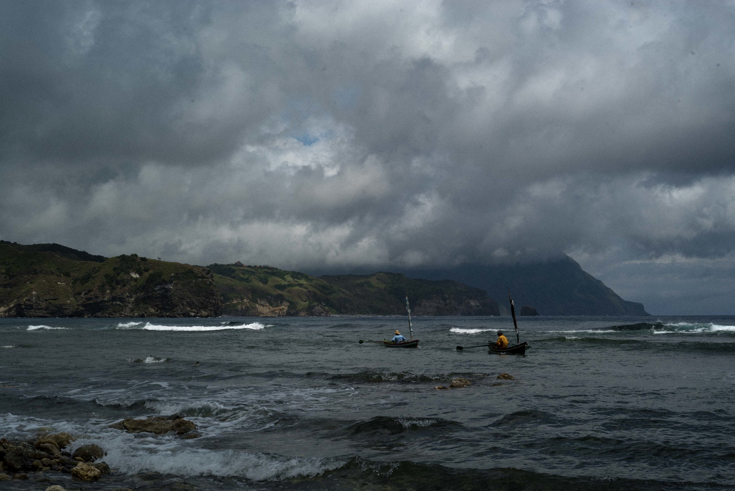 By 5AM, fishermen have paddled out into the Philippine Sea. 